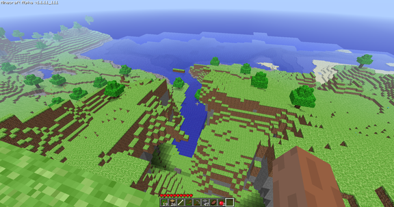 a minecraft alpha hilly landscape with bright green grass, some trees, and a view of the ocean